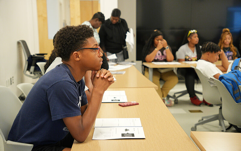 Students working in classrooms