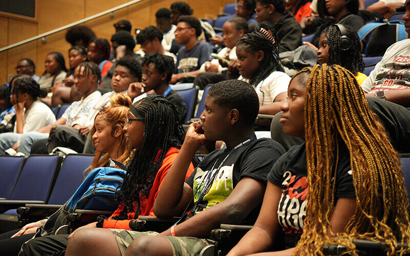 Students listening to presentations