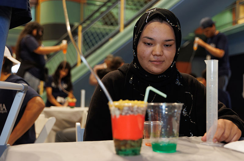 Students building reservoirs