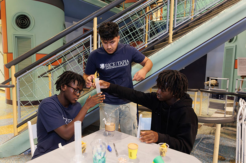 Students building reservoirs