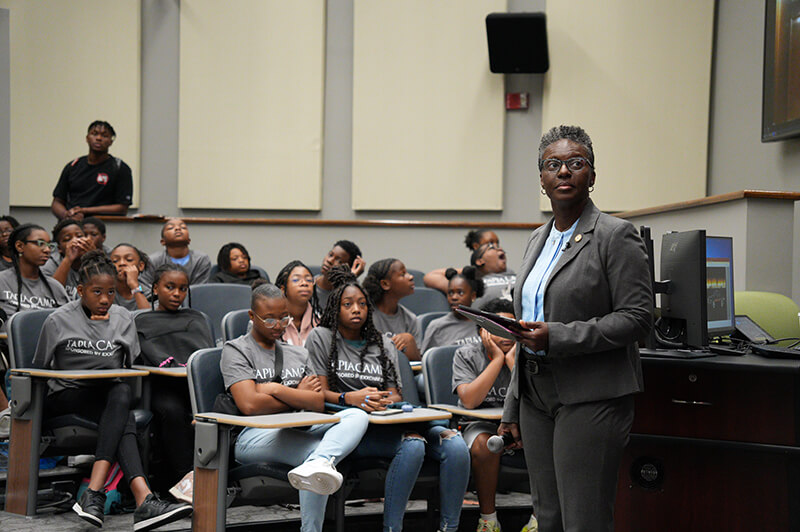 Students listening to presentations