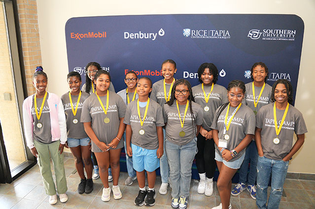 Students posing with their medals